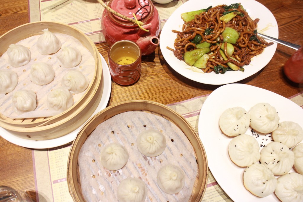 My "must haves" at New Shanghai Clockwise L:R Xiao Long Bao, Shanghai Fried Noodles, Pan Fried Pork Buns, Truffle Xiao Long Bao